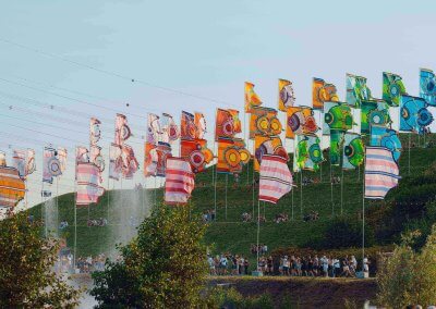 High-quality festival flags available for hire, creating a vibrant and dynamic atmosphere at outdoor events