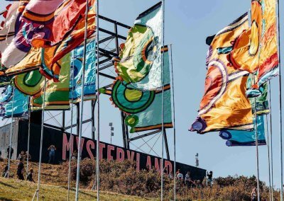 Vibrant festival decorations including colorful flags, banners, and bunting, perfect for outdoor events.