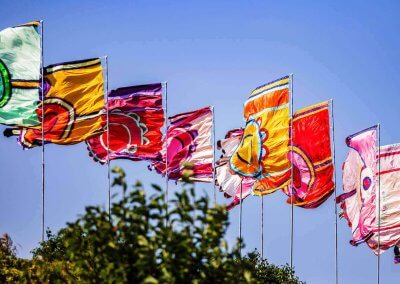 Festival flags available for purchase, offering vibrant colours and high-quality materials for outdoor events.